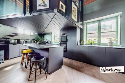 Loft - 100 m² - 3 pièces