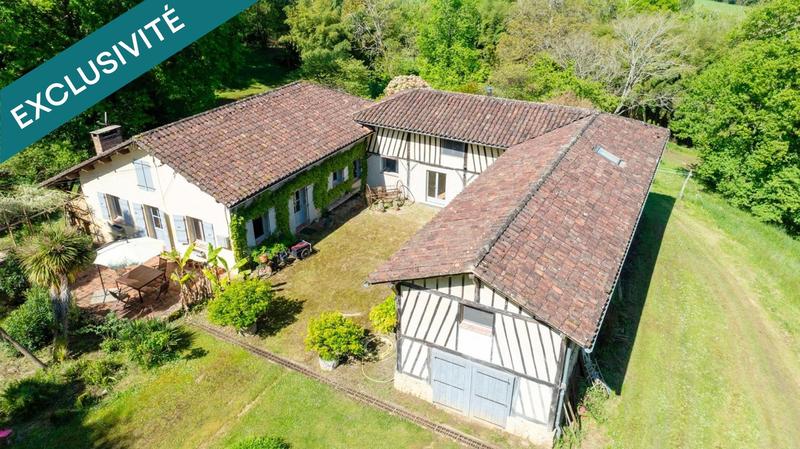 Maison - 335 m² - 10 pièces