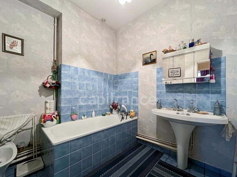 Appartement ancien - 91 m² - 4 pièces