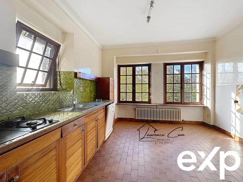 Maison - 404 m² - 12 pièces