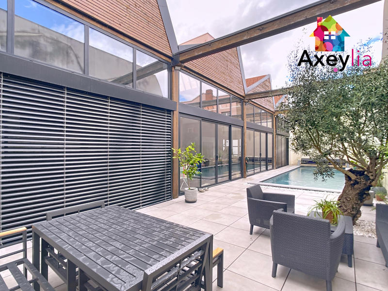 Maison - 240 m² - 7 pièces