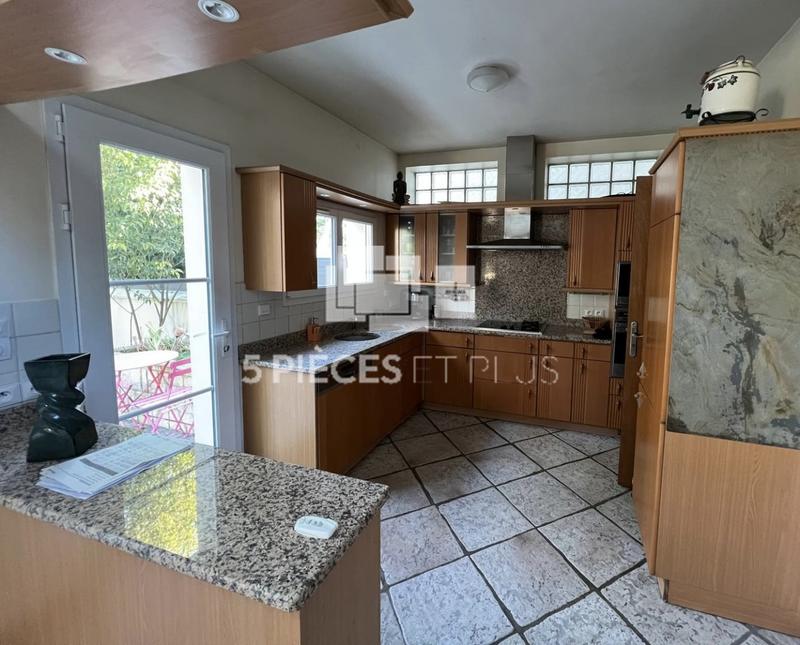 Maison - 200 m² - 7 pièces