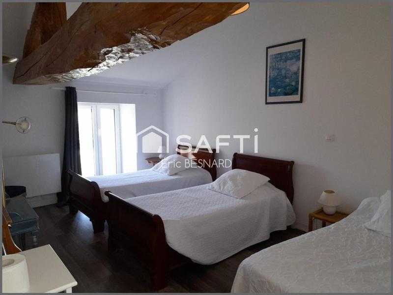 Maison - 305 m² - 12 pièces