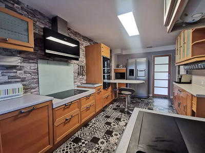 Maison - 132 m² - 10 pièces