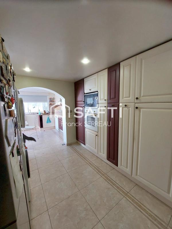 Maison - 200 m² - 7 pièces