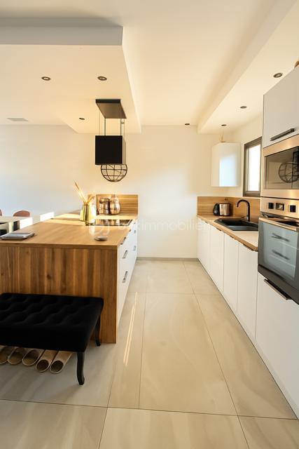 Maison - 115 m² - 5 pièces