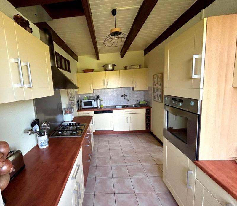 Maison - 100 m² - 6 pièces