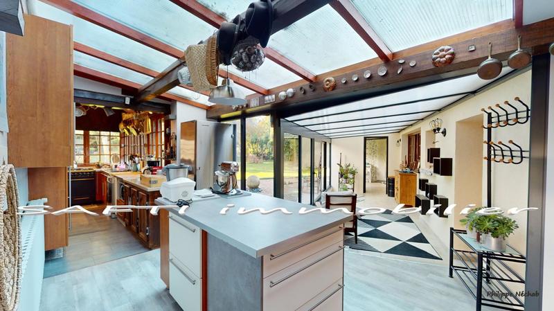 Maison - 235 m² - 10 pièces