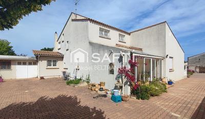 Maison - 250 m² - 8 pièces