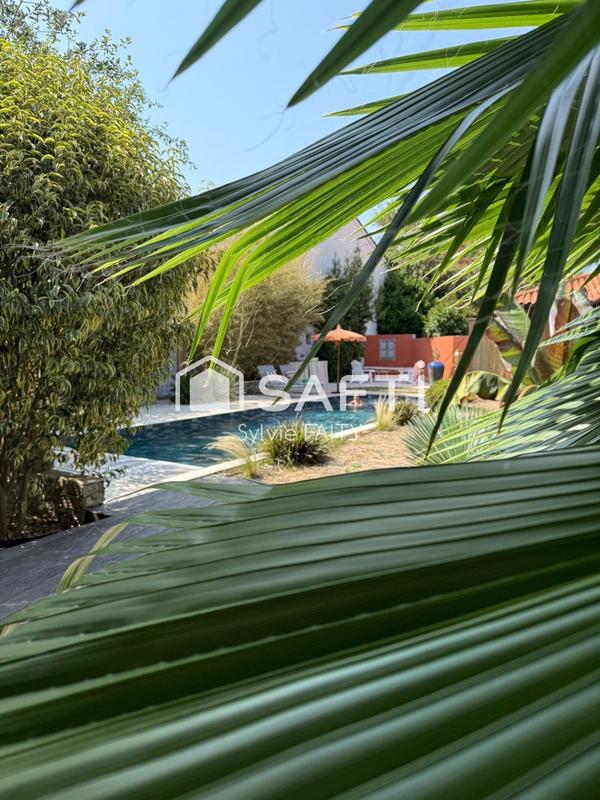 Maison - 310 m² - 8 pièces