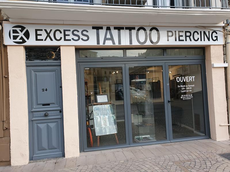 Excess Tattoo Piercing