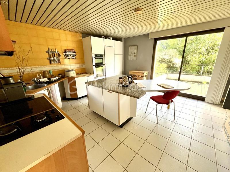 Maison - 258 m² - 9 pièces