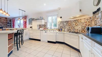 Maison - 215 m² - 7 pièces