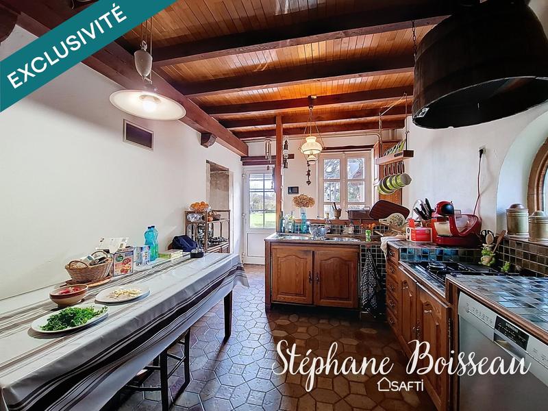 Maison - 219 m² - 10 pièces