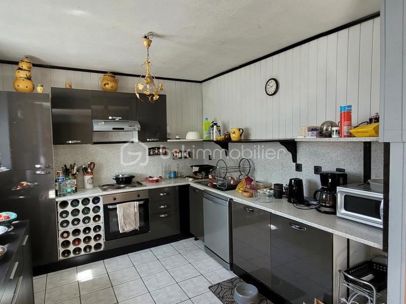 Maison - 305 m² - 13 pièces