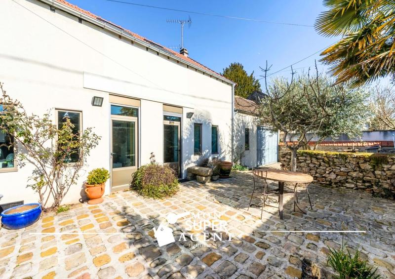 Maison - 202 m² - 7 pièces