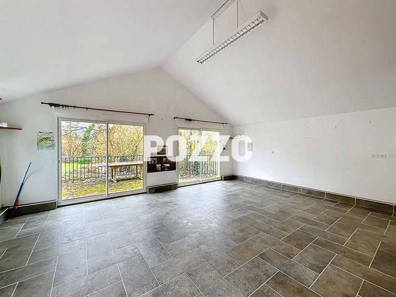 Maison - 210 m² - 7 pièces