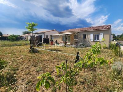 Maison traditionnelle - 90 m² - 4 pièces