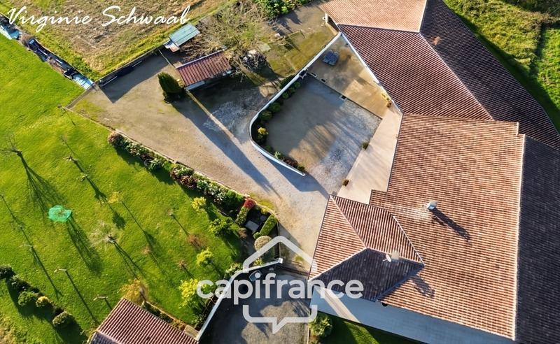 Maison - 219 m² - 8 pièces