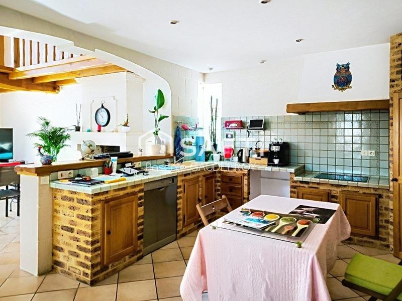 Maison - 219 m² - 8 pièces