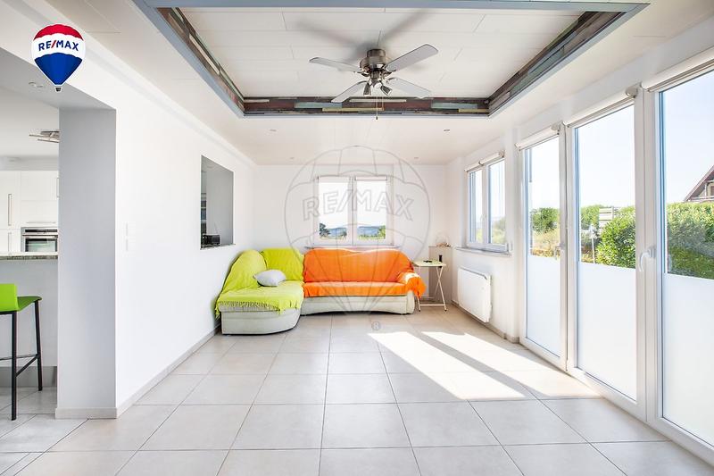 Maison - 113 m² - 5 pièces