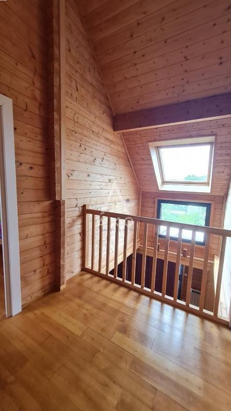Maison de bois - 126 m² - 8 pièces