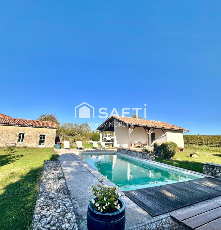 Maison - 369 m² - 10 pièces