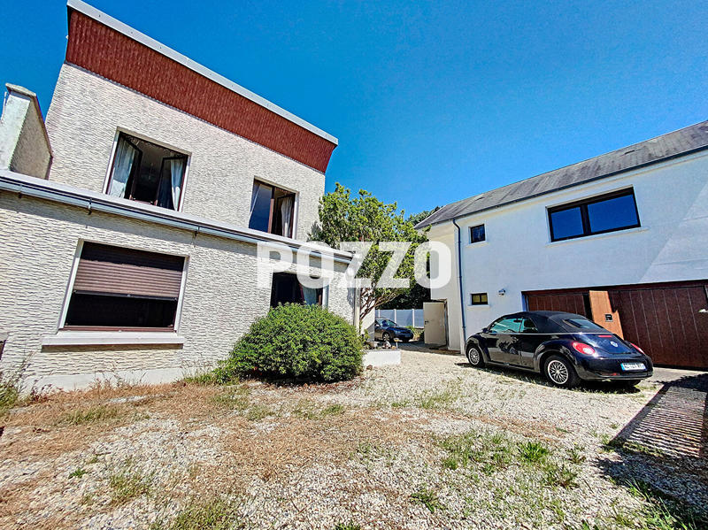 Maison - 202 m² - 9 pièces