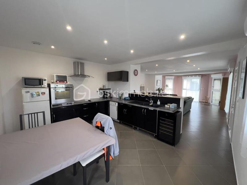 Maison - 235 m² - 8 pièces