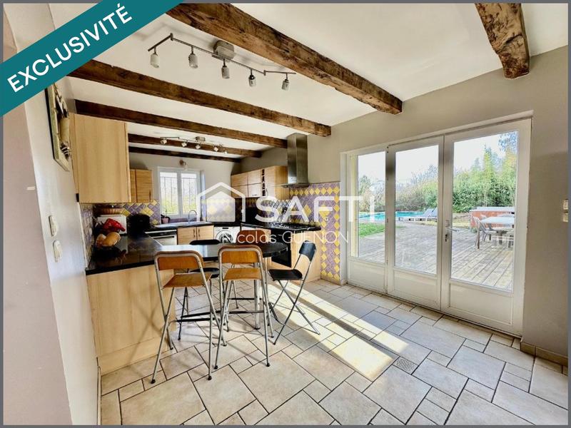 Maison - 235 m² - 8 pièces