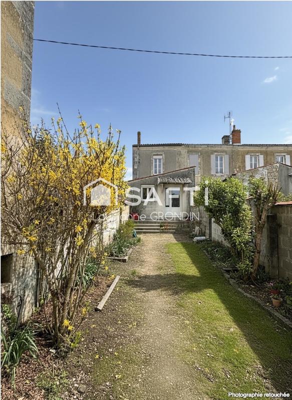 Maison - 100 m² - 5 pièces