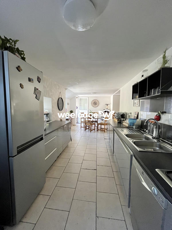 Maison - 99 m² - 5 pièces