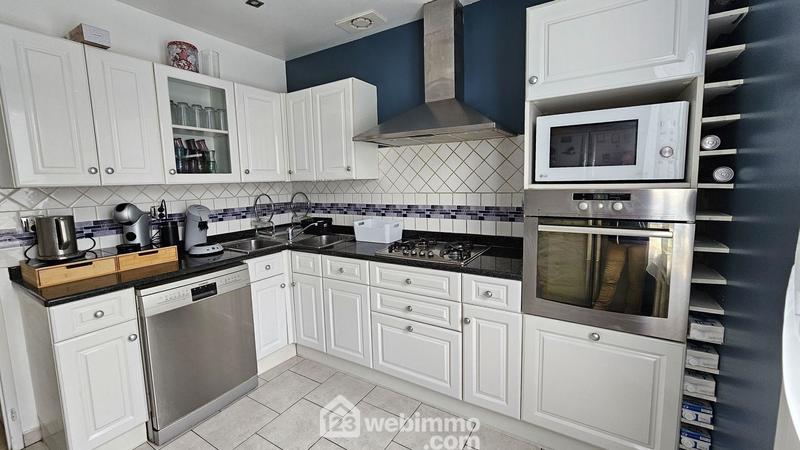 Maison - 90 m² - 5 pièces