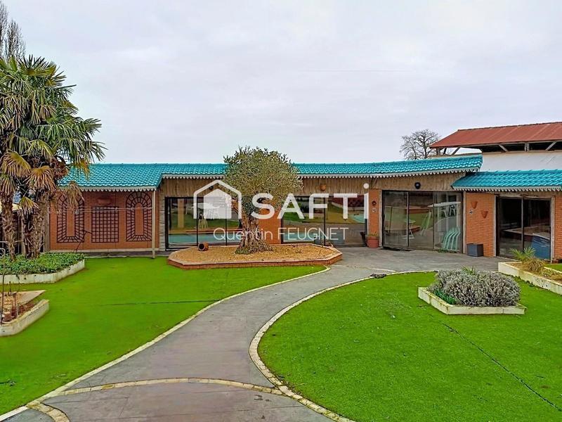 Maison - 377 m² - 10 pièces