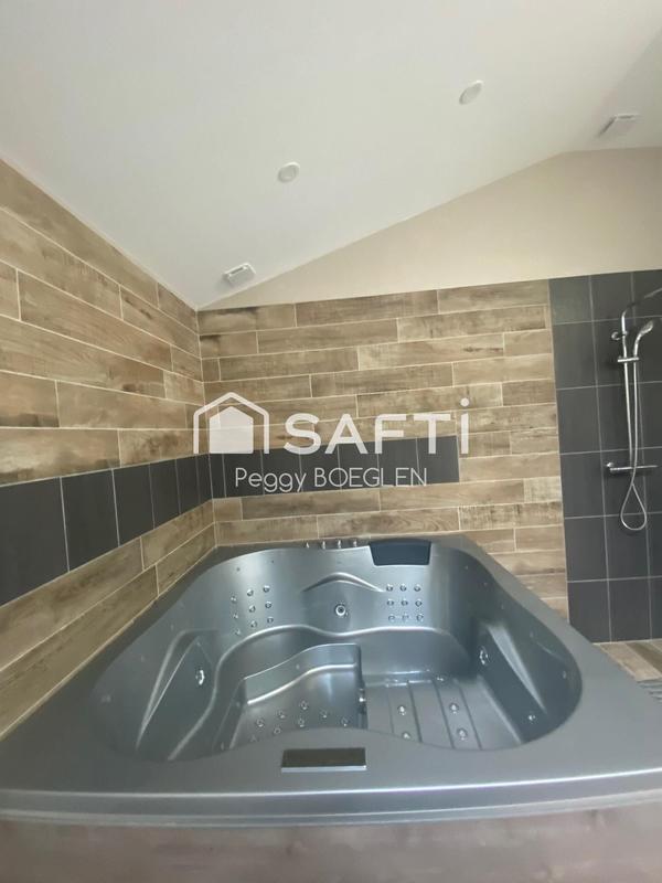 Maison - 110 m² - 9 pièces