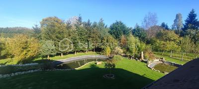 Maison - 218 m² - 7 pièces