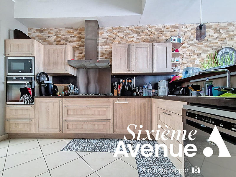 Maison - 99 m² - 4 pièces