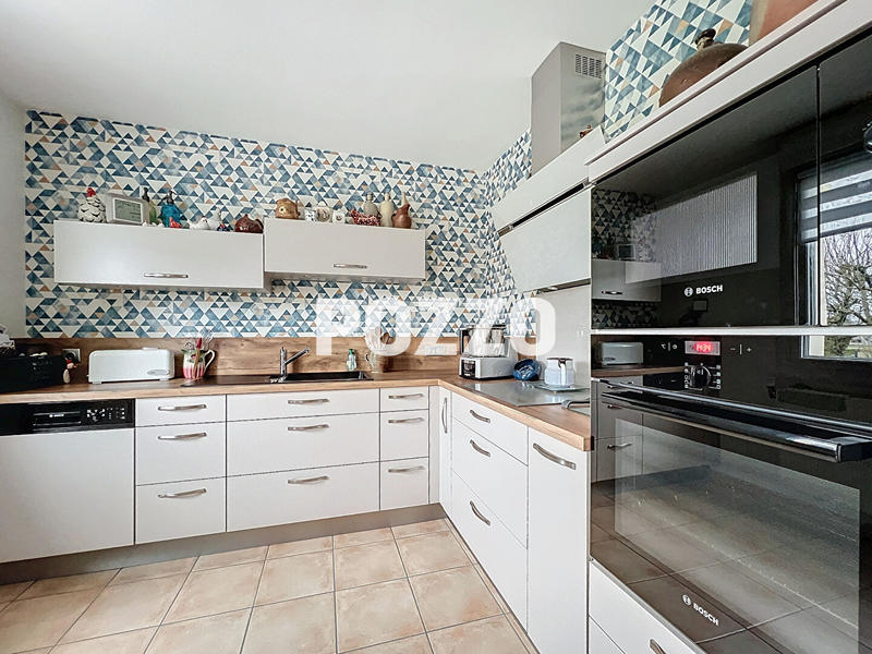 Maison - 113 m² - 5 pièces