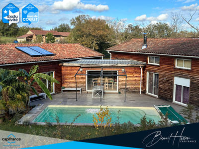 Maison de bois - 176 m² - 6 pièces