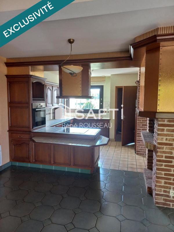 Maison - 95 000 m² - 6 pièces