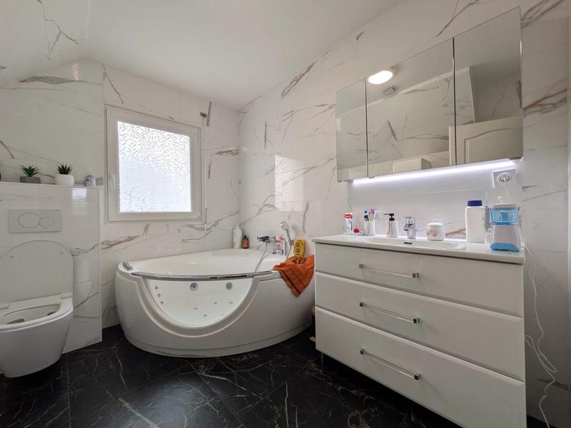 Maison - 152 m² - 7 pièces