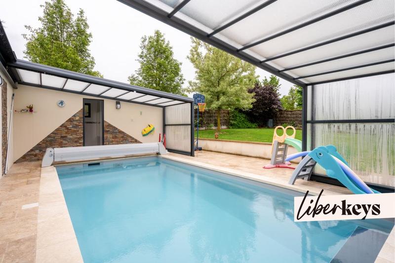 Maison - 210 m² - 7 pièces