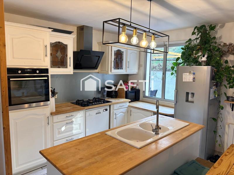 Maison - 104 m² - 7 pièces