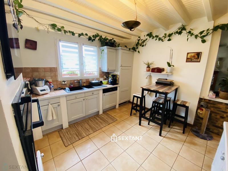 Maison - 95 m² - 5 pièces