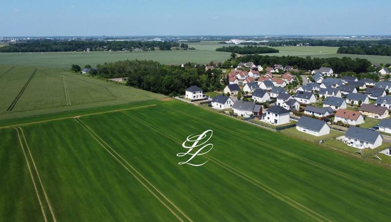 Terrain de lotissements - 605 m²