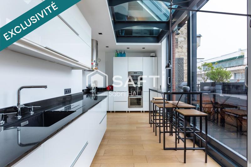 Appartement - 214 m² - 7 pièces