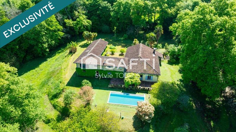 Maison - 335 m² - 10 pièces