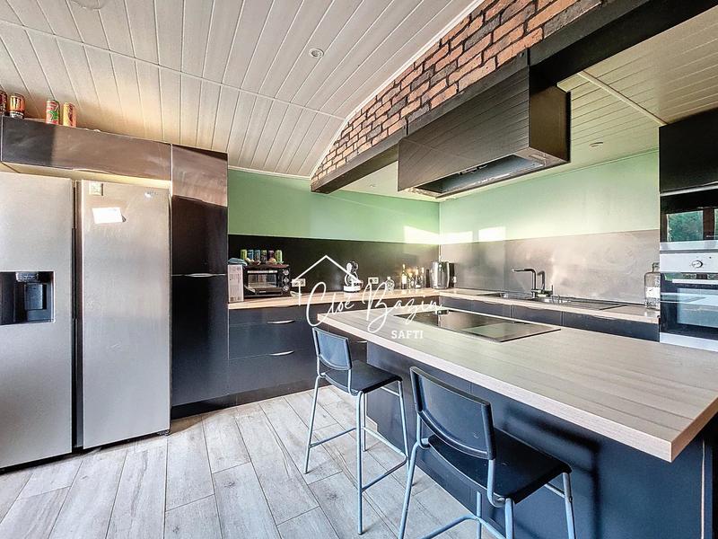 Maison - 216 m² - 7 pièces