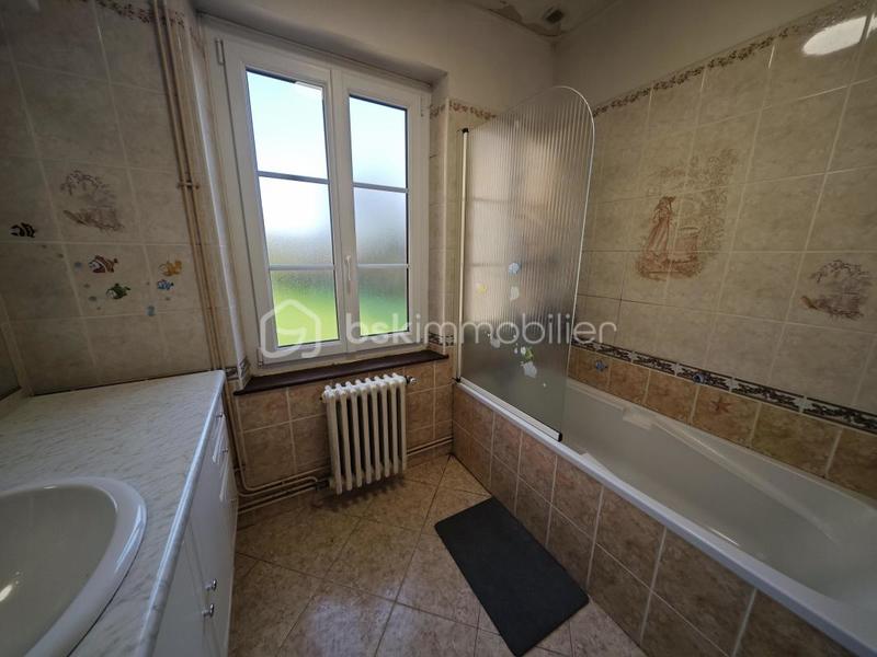 Maison - 123 m² - 9 pièces