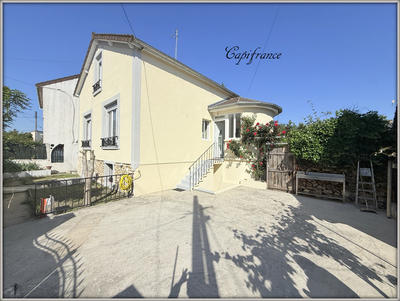 Maison - 185 m² - 8 pièces